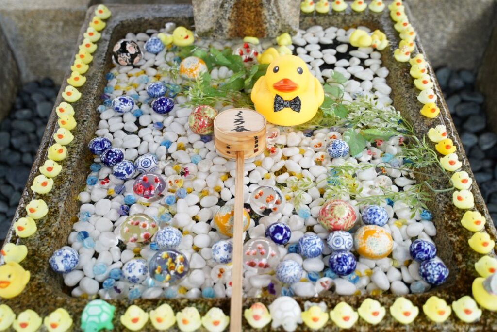 Flower hand-watering at Konkai Komyoji Temple